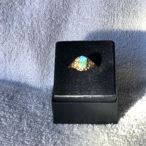 Iridescent stone ring